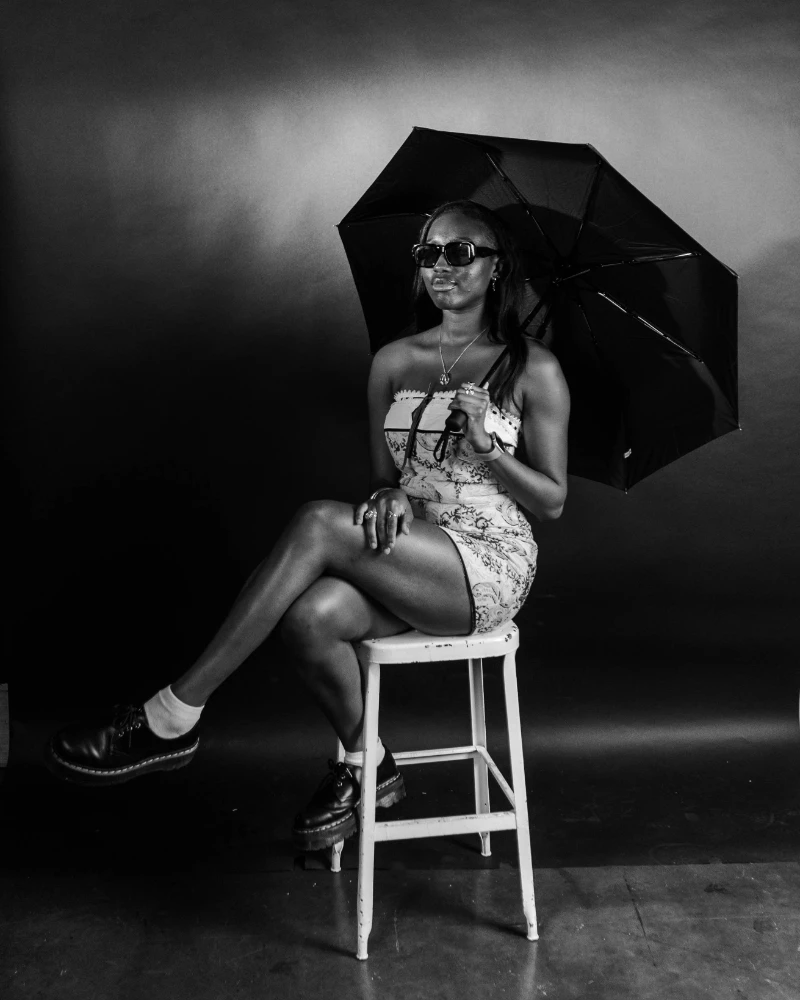 Woman Holding Umbrella